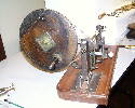 Clockmaker's throw. Adding a pulley and a wooden handwheel to a simple set of turns extends its versatility 